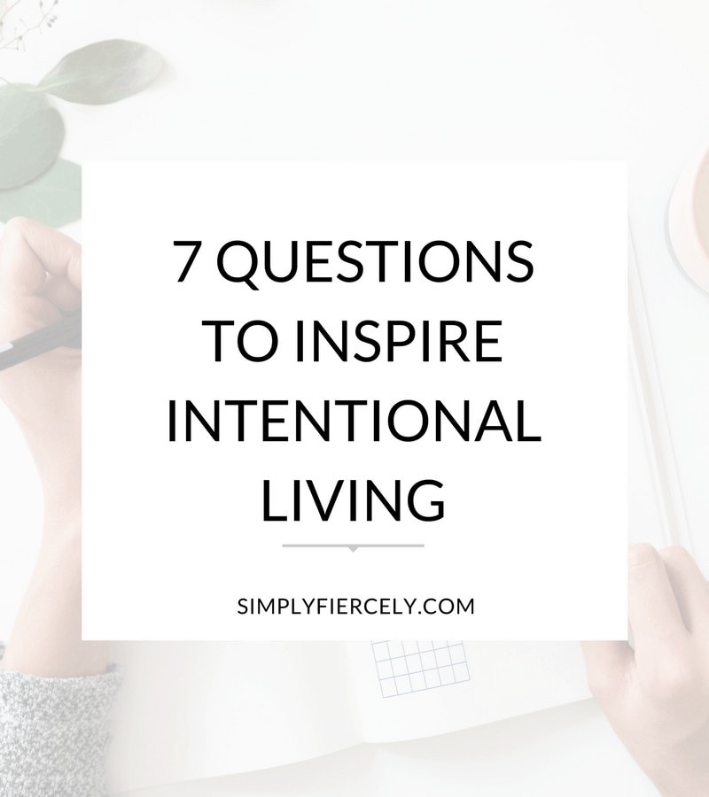 7 Questions to Inspire Intentional Living (image of hands writing in a journal)