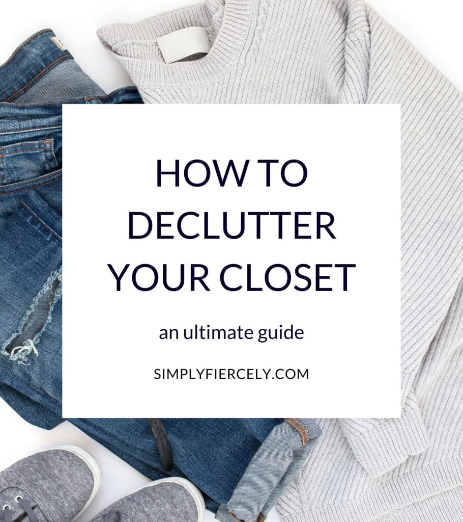 White box with the text: How to Declutter Your Closet (an ultimate guide) in the foreground. In the background is a flat lay with a grey sweater and jeans.
