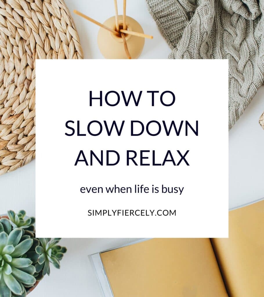 Foreground: A white box with the text "How To Slow Down And Relax, Even When Life Is Busy" Background: a bright and cozy scene with a sweater, journal, and plant.