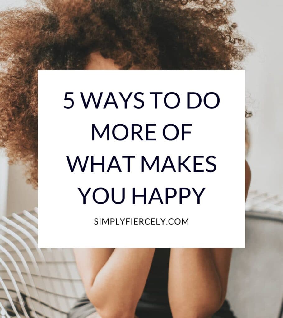 "5 Ways to Do More of What Makes You Happy" in a white box with a woman wearing a black tank top with black curly hair smiling into the camera in the background.