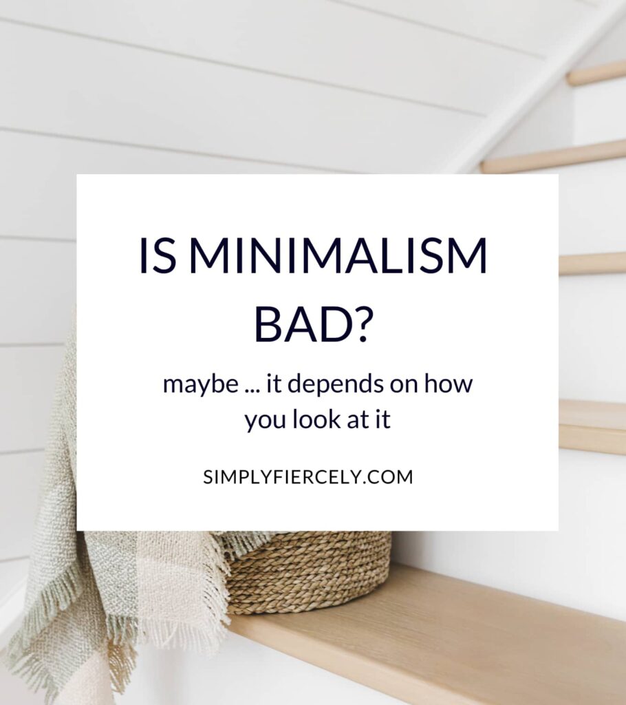 "Is Minimalism Bad? Maybe ... It Depends How You Look At It" in a white box with a straw basket with leather handles holding a beige plaid blanket sitting on a wooden staircase in the background.