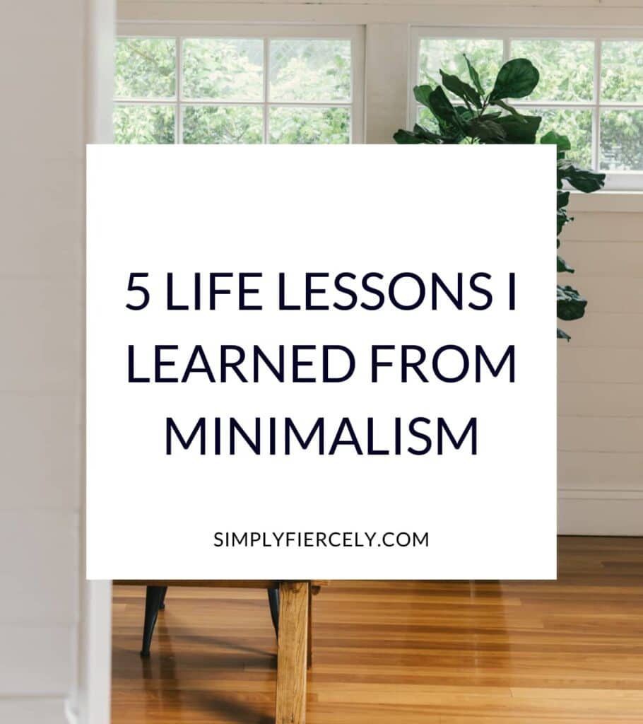 "5 Life Lessons I Learned From Minimalism" in a white box with an image of a wooden table and a plant in a room with white brick walls and hardwood floors in the background.