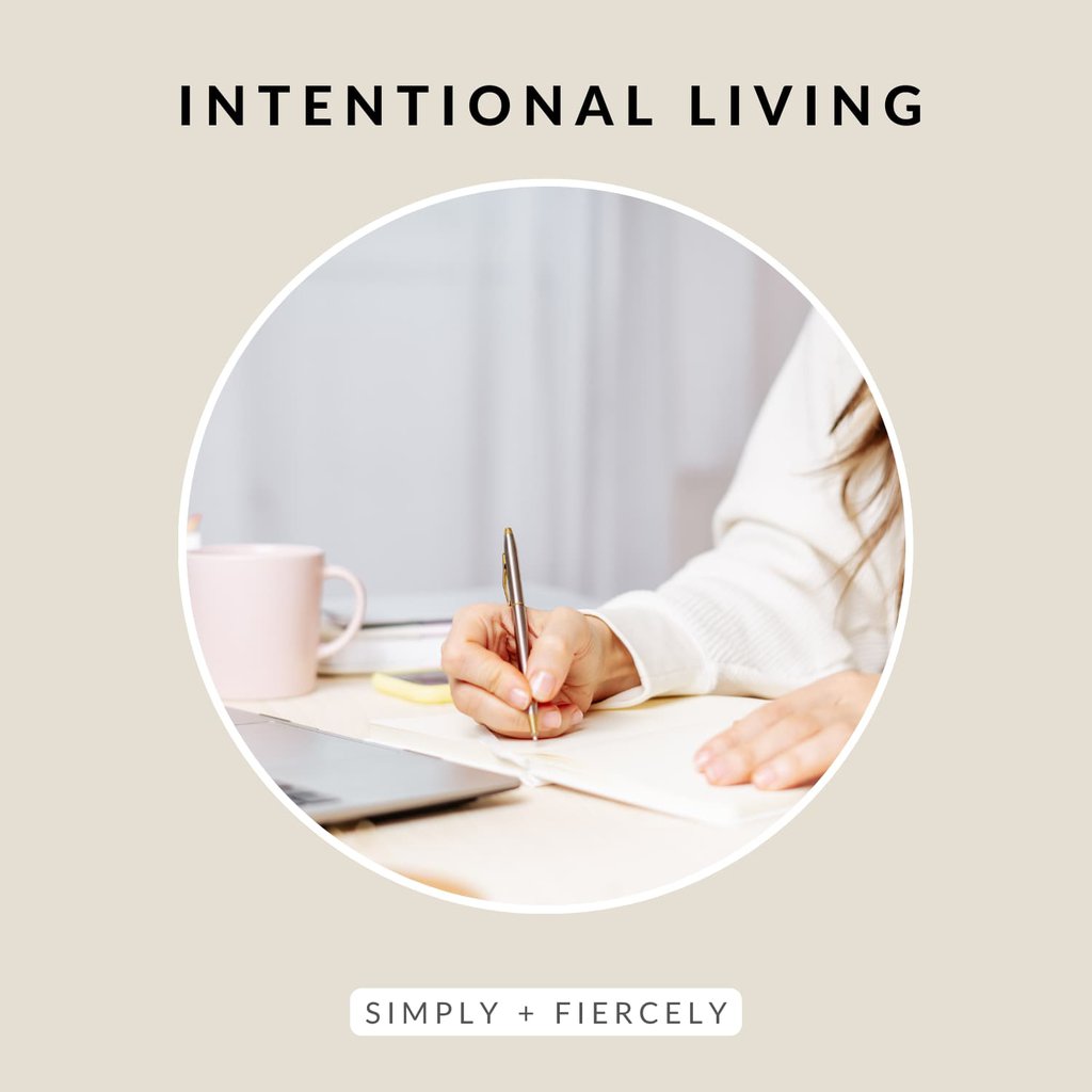 A round close up image of a woman writing in an open journal on a beige background with the words Intentional Living across the top