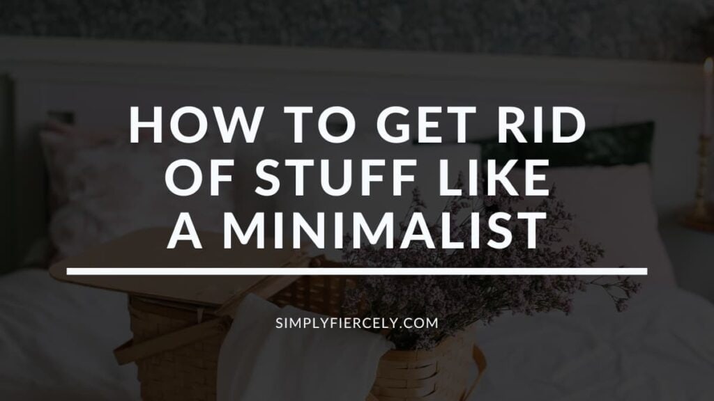 "How To Get Rid Of Stuff Like a Minimalist" in white letters on a black translucent overlay on an image of a bed with fluffy pillows and a wicker basket of lavender on top of it.