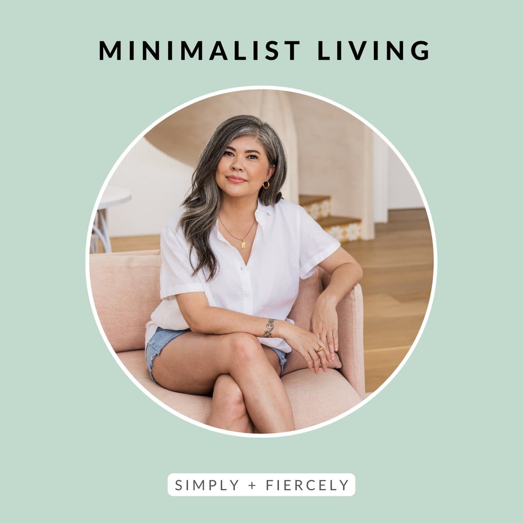 A round image of a smiling woman wearing denim shorts and a white button up top sitting on a blush sofa smiling at the camera on a green background with the words Minimalist Living across the top.