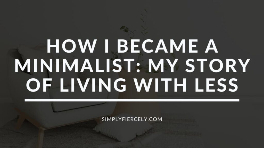 "How I Became a Minimalist: My Story of Living with Less" in white letters on a translucent black overlay on an image of a white chair with throw pillows beside a small table with a plant and a vase beside it and a throw pillow on the floor.